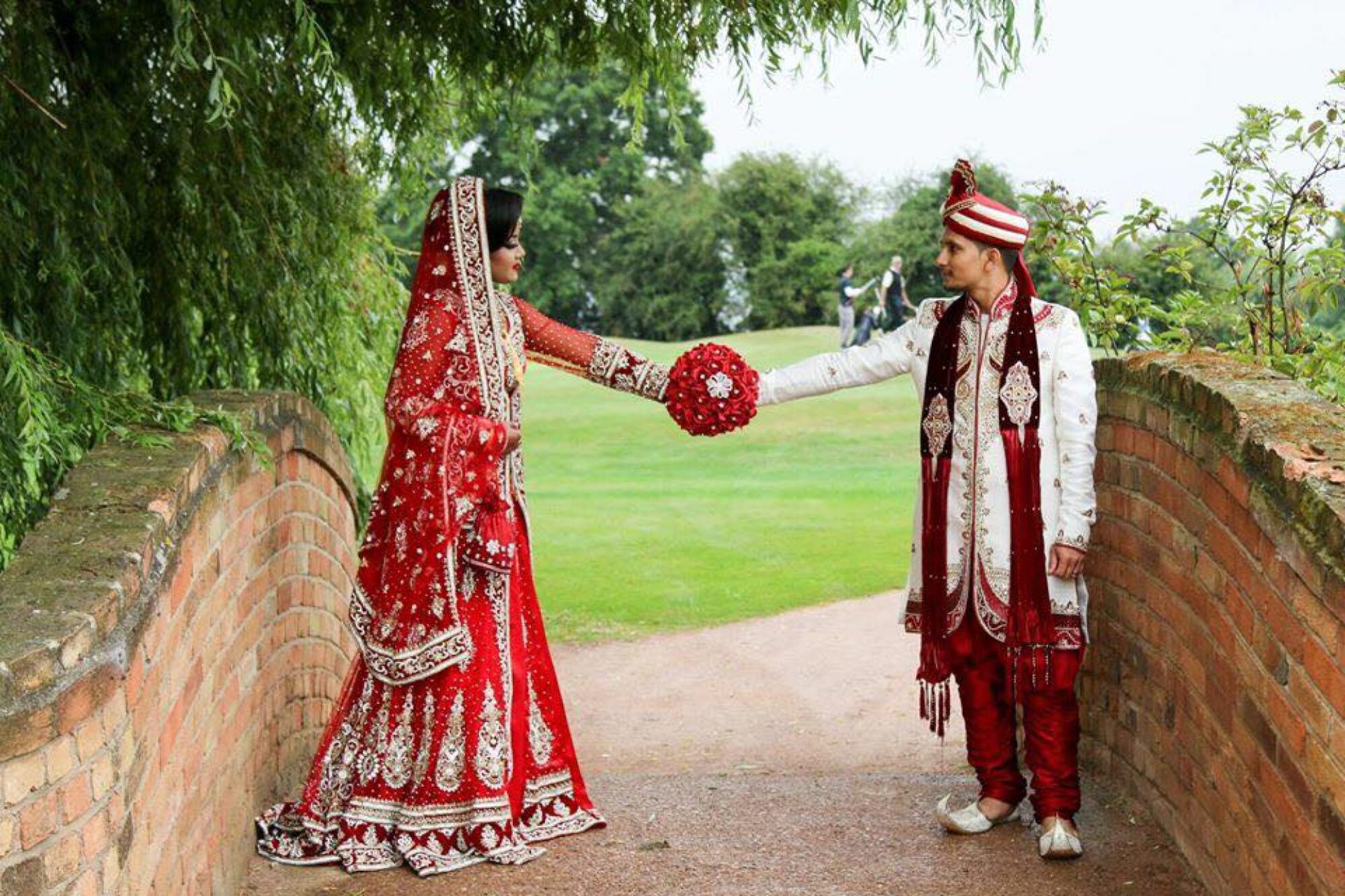 Asian couple posing together on their wedding day in Nottingham
